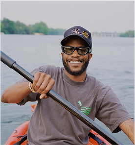Eddie paddling on river